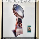 C13. Superbowl XXXVI poster with game ticket. 